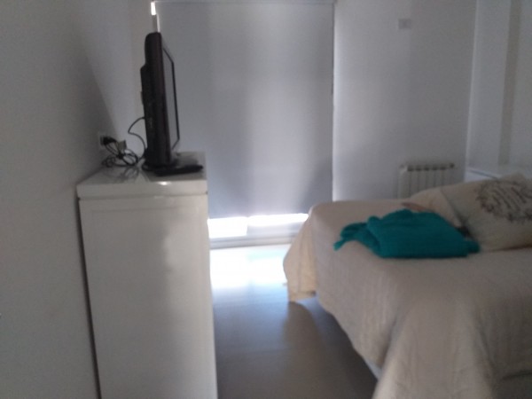 Neuquen, Alquiler, Departamento amoblado de 1 dormitorio con cochera. Barrio Santa Genoveva
